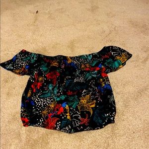 A floral blouse that is colorful